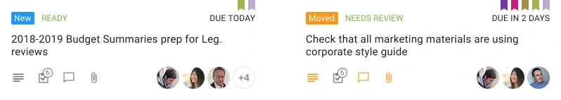 Image shows two cards from a Kerika Task Board. The card on the left has a blue New flag, indicating that it is a new task on a board that the user hasn’t seen before. The card on the right has an orange Moved flag, indicating that this task has been moved from another column by another user.  Each card also has small icons to indicate that these tasks have description (details), checklists of subtasks, attached files, and chat streams. Some of the icons are shown in an orange color, indicating that the user has not seen these changes yet.